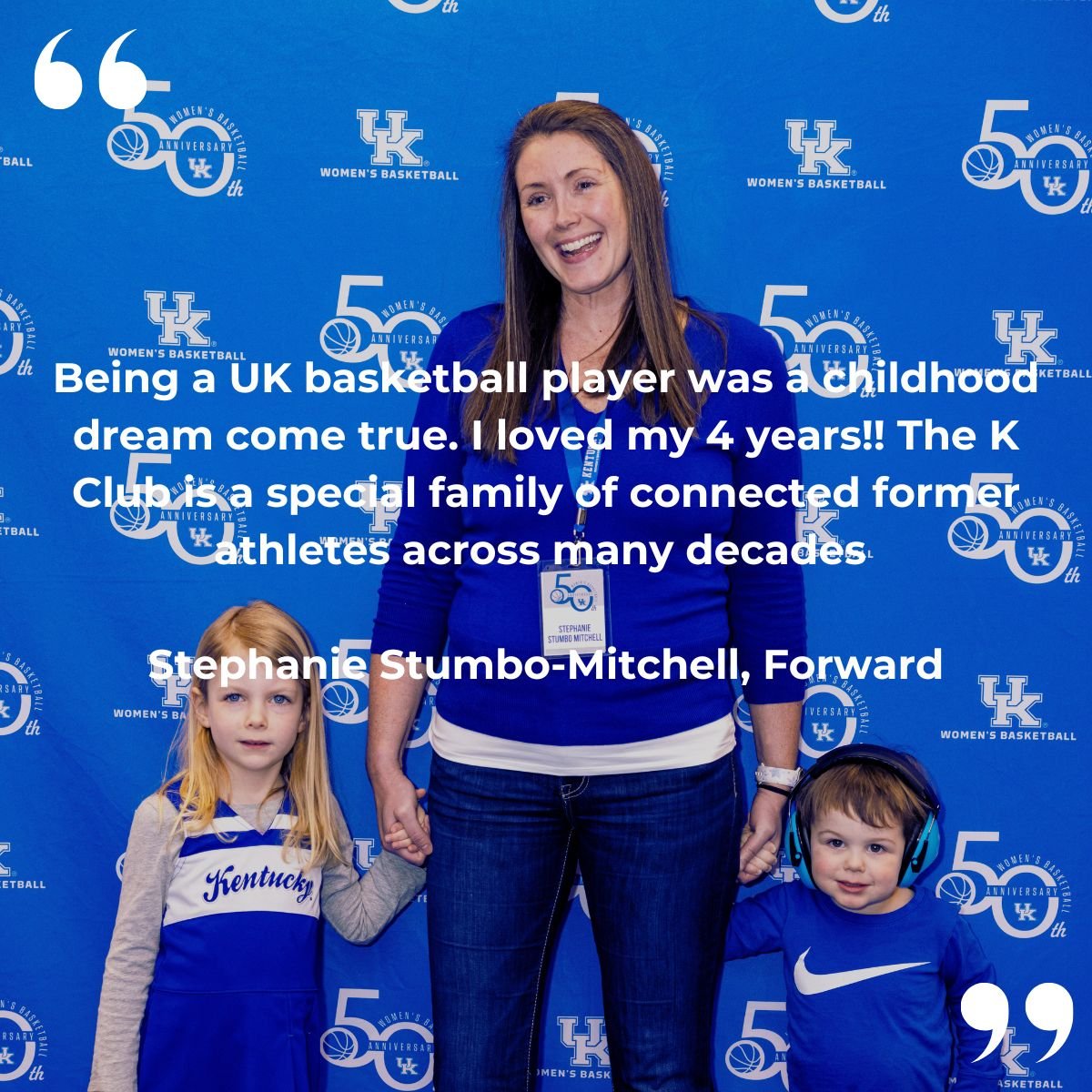 a woman standing with two kids